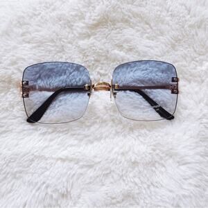 Laurel Clear Blue Rimless Sleek Sunglasses